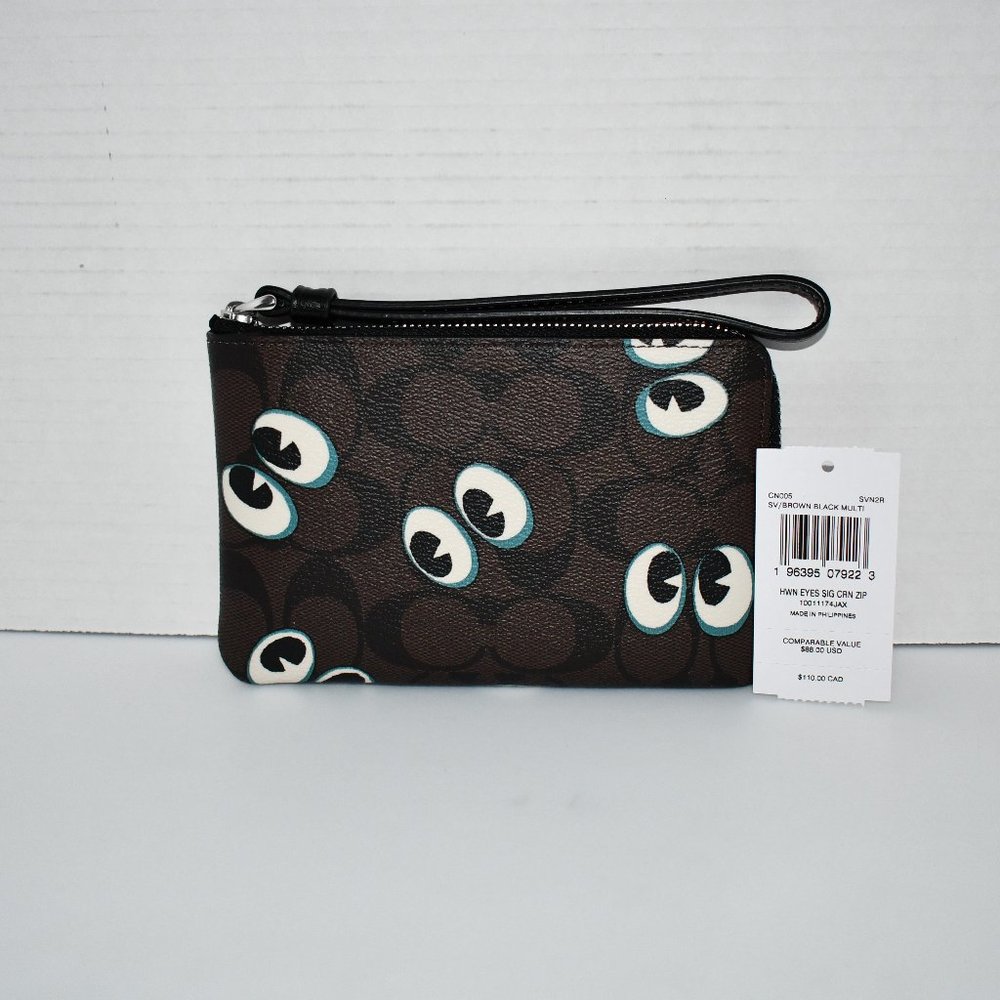 Coach Corner Zip Wristlet In Sig Canvas W Halloween Eyes in Brown/Black #CN005